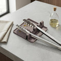 Multi-slot kitchen utensil holder for spoons, spatulas, and ladles