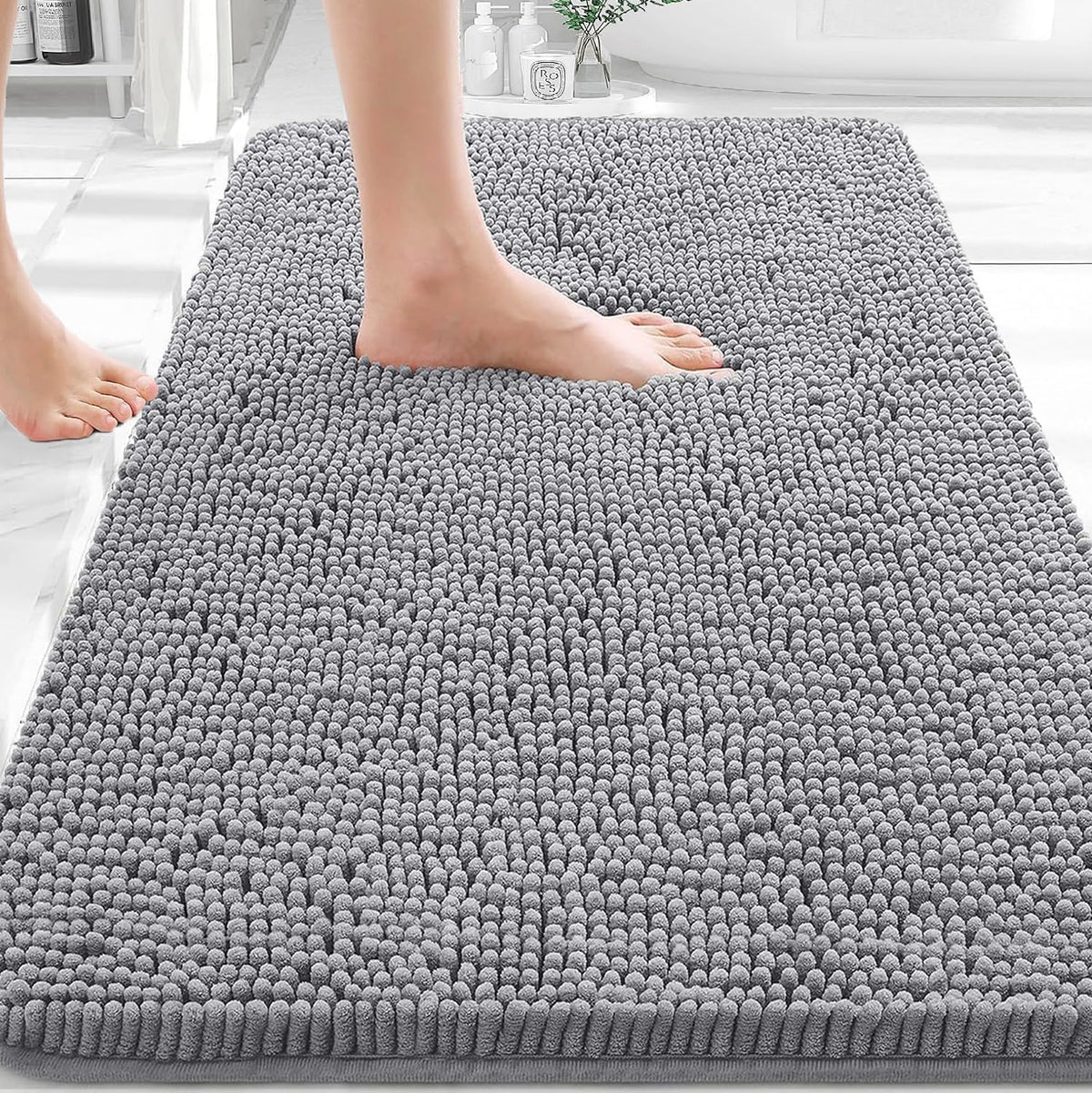 Plush bath mat designed to absorb everyday bathroom moisture
