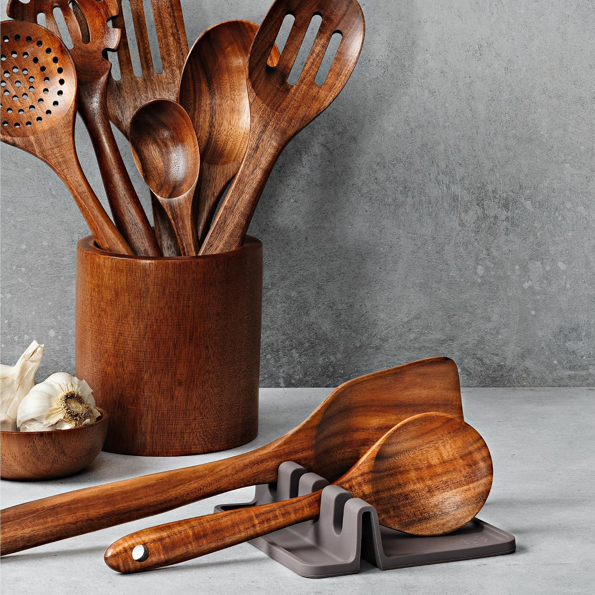 Cooking spoon resting in a silicone utensil holder during meal preparation
