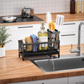 Kitchen sponge holder with an integrated holder for dish brushes