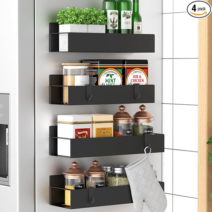 Set of four black wall-mounted spice racks for kitchen storage