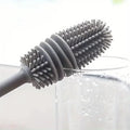 Long cleaning brush for reaching inside tall narrow bottles
