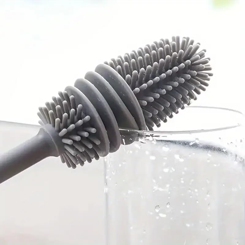 Long cleaning brush for reaching inside tall narrow bottles