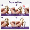 Purple personal safety alarm keychain with metal ring and wrist strap