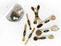 Stackable magnetic measuring spoons arranged together for convenient kitchen storage